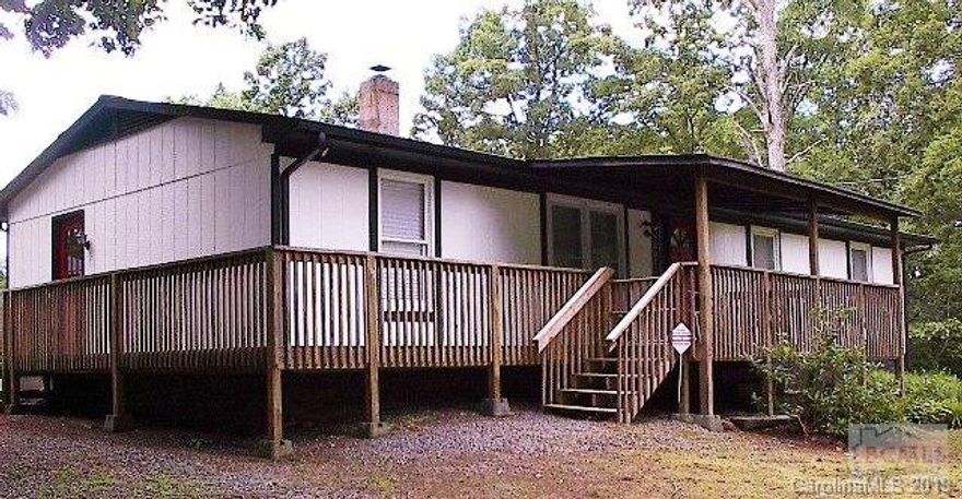 Immaculate 3 bedroom 2 bath home. Many updates and features.New wrap around decking and screened back porch for evening meals,entertaining, or relaxing.New flooring in Kitchen,1 bedroom,living room and family room. New heat pump 2-3 , water heater 2-3 years.Laminate flooring in some rooms new.located 8 miles to South mountain state park, and only a few miles to George Hildebran Elementary. This home offers lots of room inside and out. Storage building stays with home.All earnest monies should be made out to closing atty or Buyers agent firms trust