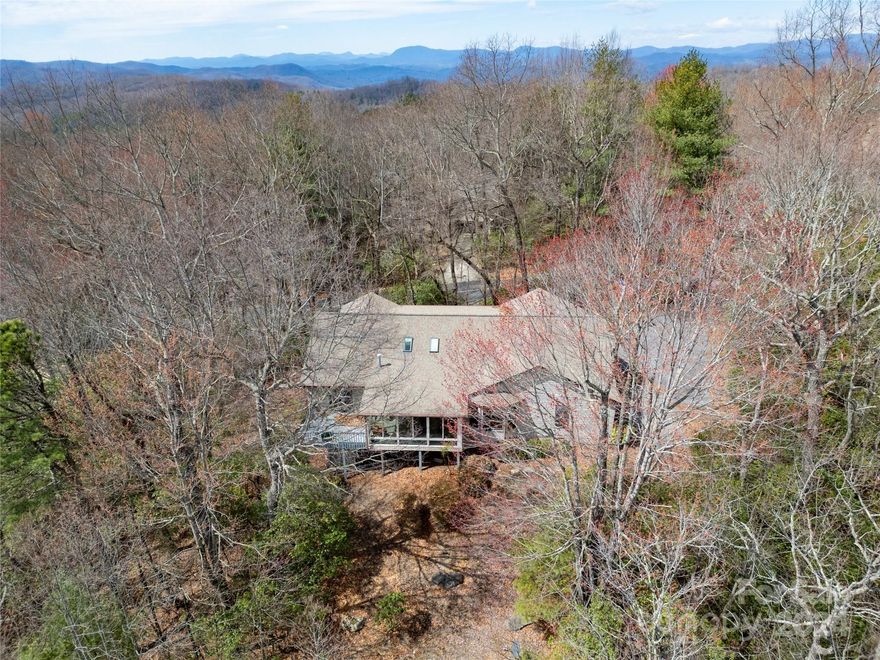 Three bedroom 2 bath main level living in Connestee Falls.  Home sits on a partially finished basement with bonus room and work shop.  3 season sunroom off the back, vaulted ceilings, stainless steel appliances and original hardwood floors in the kitchen and master.  Connestee Falls is a gated community with an 18 hole championship golf course, four mountain lakes, 17 plus miles of private hiking trails, a community pool, pickle ball courts, tennis courts, bocci courts as well as a 26,000 square foot clubhouse.  Come see why we live where we play!