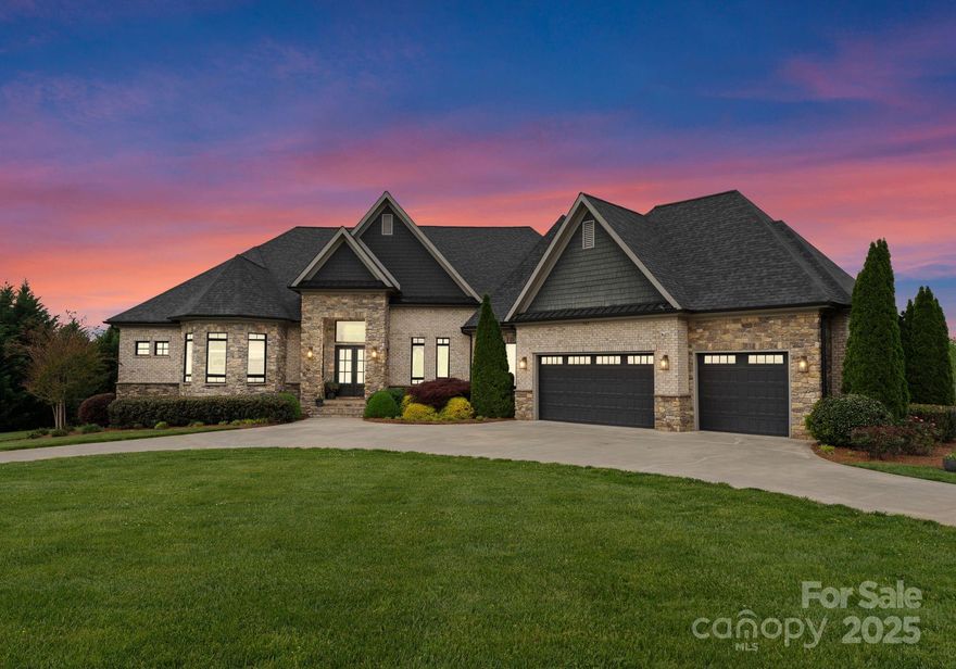Impeccably maintained and beautifully designed, this custom full-brick ranch sits on a serene 1.33-acre lot, offering privacy, elegance & effortless living. From the moment you arrive, the curb appeal captivates with professional landscaping, a circular drive, and a welcoming covered entry. Inside, enjoy a spacious one-level layout filled with natural light and upscale finishes throughout. The heart of the home opens seamlessly to a covered outdoor living space, ideal for entertaining or quiet relaxation. Step into your own backyard oasis featuring a stunning saltwater pool & spa, surrounded by travertine decking and lush greenery. The expansive yard offers room to play, garden, or simply enjoy the peaceful surroundings. With a oversized 2+car garage, oversized driveway & premium finishes this home offers the perfect balance of luxury & comfort. Located minutes from Lake Norman, shopping & dining, this is the lifestyle you’ve been waiting for—refined, relaxed, and truly one of a kind!