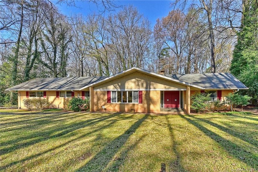 Great opportunity in South Park area. Excellent location, 0.73 acre lot offers the ability to renovate existing home or build your custom home. Features include: full brick exterior, 3 bedrooms, 2.5 baths, den, formal living and dining rooms, finished basement, screened porch, 2 car carport and wooded back yard. Minutes to all of the best shopping and dining South Park has to offer. Near Country Day, Carmel CC and MPCC.