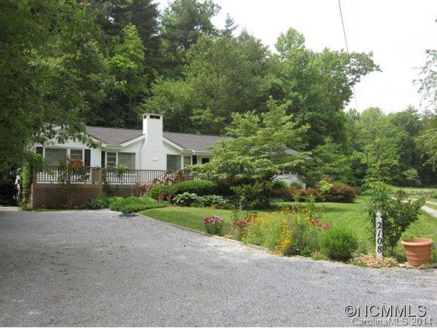 Enchanting Gardener's Paradise tucked away on 1.95 gorgeous private acres. Multiple garden areas & natural setting featuring stream bordering property, 2 deck areas w/ portico overlooking huge rock & man built waterfall, expansive suite, spacious kitchen w/ breakfast area, dining rm w/view of rock/gardens, spacious family rm, living rm w/ fireplace & built-in bookcases, HWD floors. Multiple garden sheds & potting areas. Newer HVAC. RARE FIND