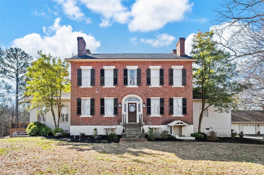 Welcome to the gorgeous historic Hoke-Rhyne house built in 1844, located 45 minutes from Uptown Charlotte. This colonial-style home gets you the best of old-world charm while offering a spacious layout on a sprawling property. This home sits on a rolling 7-acre lot adjacent to the South Fork Catawba River and includes a fenced brick patio & garden, a pool, a barn, a shed, and a 3-car garage. This home is perfect for those that love outdoor living! On the main level, there are two large primary bedrooms both with newly updated ensuite bathrooms, a spacious den with a wood-burning stove, and a newly remodeled kitchen. Upstairs there are two sun-soaked bedrooms that have additional dressing/sitting rooms and another fully updated bathroom. This home offers an unbeatable location with close proximity to both Charlotte and the mountains. Calling this place home, you will own a piece of North Carolina history!