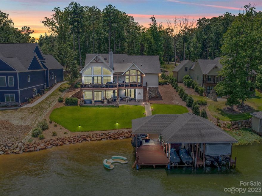 Gorgeous waterfront home on Lake Tillery,located in the prestigious gated community,Eagle Pointe.The minute you step into this home,you will be in awe of the lake views from the expansive windows.The great room features cedar beams, cathedral ceilings and a soaring, stone fireplace with gas logs.The beautiful open kitchen has custom cabinetry, granite counters, large island/breakfast bar with seating. A spacious primary bedroom is located on the main level & has a walk-in closet.The primary bathroom has dual vanities& tile shower."Bonus" room on the main is currently being used as bedroom, but would also make a great office.Covered porch with wood ceiling,stone fireplace,dining& a cozy sitting area ...making this perfect for relaxing&entertaining.Finished basement has 2 bedrooms,1 bath,great room,wet bar.Amazing boathouse(1 boat slip, 1 slip for 2 jet skis)with covered sitting area,storage room for all your lake toys,stone boulders at shoreline.Outdoor half bath- great for lake guests.