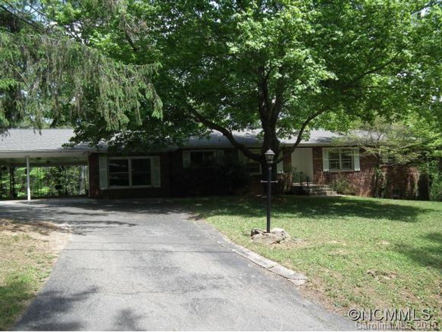 Great Black Mountain Golf Club lot, on #8 Tee.  House needs TLC.  recent comps in the neighborhood sold for $350,000.  Large lot with great view potential after some tree trimming.