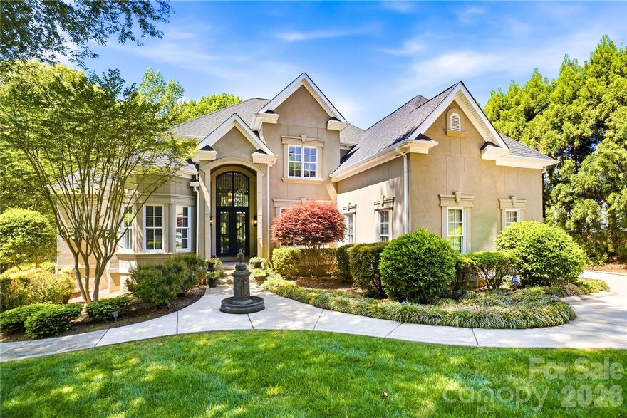 Welcome to a luxury waterfront residence on Lake Norman, offering a rare combination of refined interior upgrades, highly functional outdoor living, and one of the most desirable lot profiles on the lake.

Positioned on a flat, fully usable waterfront lot, this property eliminates the typical challenges of sloped lake homes. Enjoy a gradual walk to the shoreline, private steps to the water, and a substantial covered dock, designed for both boating convenience and elevated lakeside entertaining.

Inside, the home delivers intentional, high-impact upgrades. The luxury primary suite renovation features dual, separate closet spaces and an oversized walk-in shower with a clean, spa-inspired design, creating a true owner’s retreat. The home offers multiple living areas anchored by three fireplaces, providing both architectural presence and comfortable gathering spaces throughout.

The lower level is designed with both entertainment and future flexibility in mind. A dedicated wet bar area creates a natural hosting environment, while the wine cellar (framed and ready for completion) offers an immediate opportunity to customize and add value. A large, heated workshop space provides versatility to keep as a workshop/lake storage area or for a home gym, hobby studio, or future finished living area, depending on your needs.

Outdoor living has been thoughtfully executed to match the lake lifestyle. The property features a built-in grilling station with permanent countertop space, an outdoor shower for post-lake convenience, and a wide, level backyard that is increasingly difficult to find on Lake Norman - ideal for both entertaining and everyday enjoyment.

Additional features include a large three-car garage with professionally finished epoxy flooring, a double-door front entry into a two story great room, and a layout that balances formal spaces with open, livable flow, including a dedicated main-level office or den with fireplace and a formal dining area for hosting. There also previously was a bedroom in the lower level that the seller opened up to enlarge the lower level rec area. A wall could be built to make an additional bedroom and/or in-law suite. 

Located within the Northview Harbour neighborhood, this home also offers access to a well-established, amenity-rich community including pickleball and tennis courts, a clubhouse, a pool, a boat ramp, boat and RV storage, walking trails, a playground, and organized neighborhood events... all within the rapidly growing and highly sought-after area of Sherrills Ford. Sherrills Ford is conveniently located offering an easy drive via either side of the lake (head towards I-77 or Hwy 16) to reach uptown, the airport and more. Nearby amenities include grocery stores, restaurants, shops and further growth is coming soon. 

This property represents a rare opportunity to secure a move-in ready, upgraded waterfront home with long-term upside. Its location offers tremendous value through lot quality, lifestyle, and growth potential.