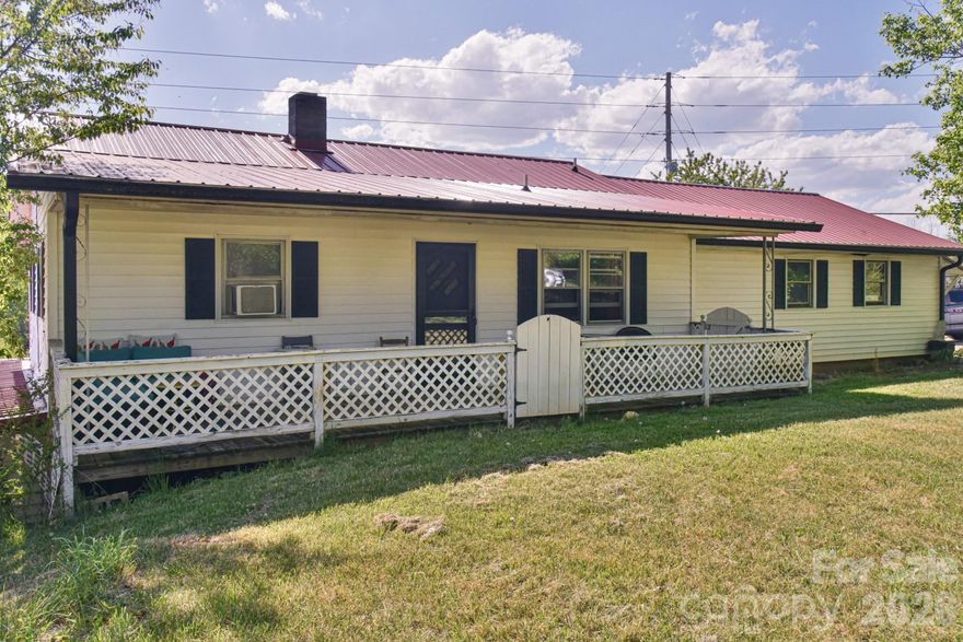 Absolutely stunning 35± acre property offering everything you’ve been searching for. This exceptional tract features rolling, usable land with breathtaking long-range mountain views, a small stream winding through the property, and a peaceful pond.  Multiple ideal building sites provide the perfect setting to create your dream estate, whether you’re seeking complete privacy or sweeping views. Existing home with barns and outbuildings offer excellent potential for a working homestead, hobby farm, or equestrian use, while the current home allows for immediate enjoyment or future customization.  With Open Use County zoning and a prime location just minutes from Asheville and Weaverville, this property offers unmatched flexibility and convenience. The possibilities here are truly endless.