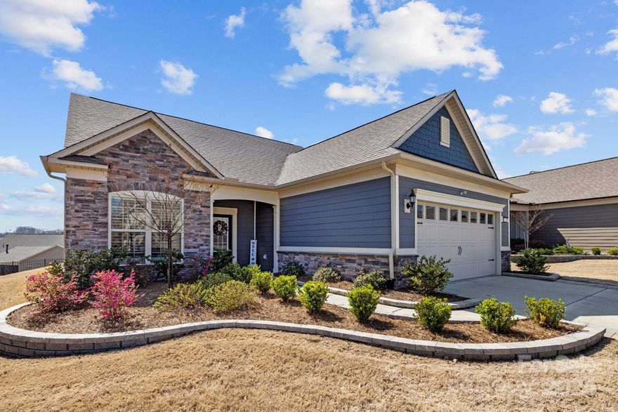 This is the one you have been waiting for! The home in the 55+ community of Carolina Orchards featuring a sunroom, upgraded kitchen, a flex rm, 3BR and 3 BA, an office and walk-in storage. This home boasts a gorgeous white kitchen, with a gas cooktop, full sized drawers, a wet bar, wall oven, Stainless steel appliances and vent hood, a wine fridge and a wine rack. The beautiful natural light shines through the sunroom and into the elegant dining room. A gas fireplace is the focal point of the cozy family rm which leads to the primary suite. Enjoy a spa like primary bath with a garden tub, glass enclosed shower, beautiful tile floors, dual vanities and a customized closet. There is a secondary BR and a full bath, laundry rm and drop zone. Upstairs will wow you with a fantastic loft, easy to access storage, a flex rm and 3rd BR and BA. Plus enjoy an amenity rich community with indoor and outdoor pools, recreation center, tennis courts, fitness center and pickleball! Don't miss this one!