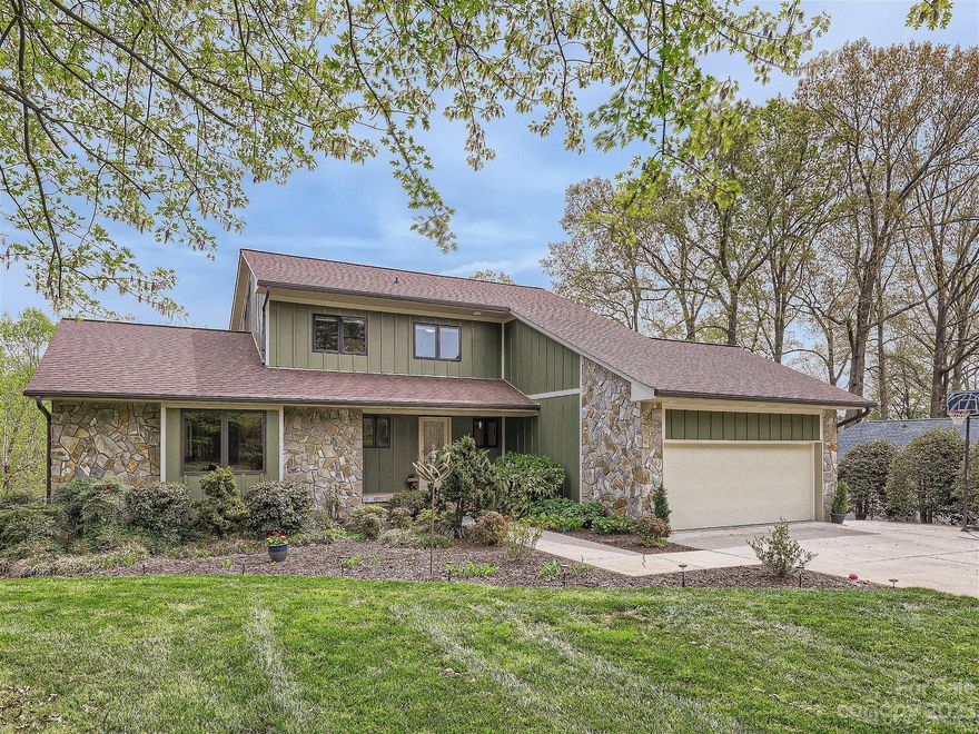 This home is absolutely stunning!  The lake view with private covered dock and boat lift is breathtaking but the house doesn't dissappoint either.  The primary bedroom is a perfect size and contains a large walk in custom built closet.  The primary bath features a large dual head shower, seperate garden tub and dual vanities.  The great room and kitchen are flooded with natural light and amazing views with access to the rear deck. Upstairs boasts 2 large secondary bedrooms with ample closet space.  The basement makes for a perfect guest suite or second living quarters.  It features a sitting room, bedroom, office and small kitchette area.  From here you can choose to walk out to an open air patio or turn the other way and enter a beautiful screened in porch.  Plus, the storage is fantastic.All of this sits on a specatular lot with multiple levels, a huge driveway and in a comunity with no HOA!!!  This home will truly be someone's dream home...make it yours!