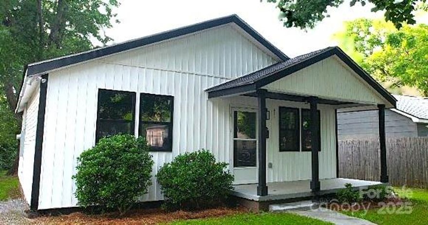 Welcome to this renovated 2-bedroom, 1-bath ranch located minutes from downtown Rock Hill. Recent updates include new electrical and plumbing systems. The home features an open-concept living area with fresh paint, updated flooring, and ample natural light. The kitchen is equipped with quartz countertops, stainless steel appliances, a refrigerator, and new cabinetry. Both bedrooms have updated fixtures and closet space. The bathroom has been remodeled with contemporary finishes. Exterior features include a new deck and a spacious backyard. A GE washer and dryer combo are also included. The property is conveniently located near shopping, dining, and parks. Back on the market. No fault of the seller — buyer financing fell through.