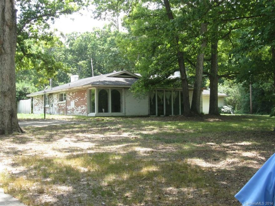 Older sprawling home on 13 acres in the West Stanly area. Fenced pasture with an older barn.  Home needs some tlc.  5 bedrooms, 3 baths with formal living areas.  Replacement windows.  Home can really be a showplace with  a little work.  Excellent opportunity to have a mini-farm out in the country.