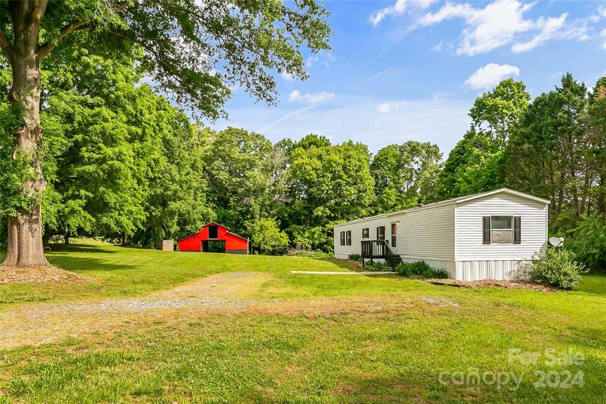 Located in the desirable Mountain View area, this 2BR/2BA one level home features new flooring, fresh interior paint, and a beautiful barn! Cozy living area. Spacious kitchen with plenty of storage space, kitchen island, and coffee bar area. Primary bathroom with a large tub, shower and double sink. Laundry room on main. Flex room can be converted into an office, bedroom, playroom or entertainment! Great location close to Hickory, Newton, and HWY 321! Located in Blackburn, Jacobs Fork, and Fred T. Foard school district! Schedule your private tour today!