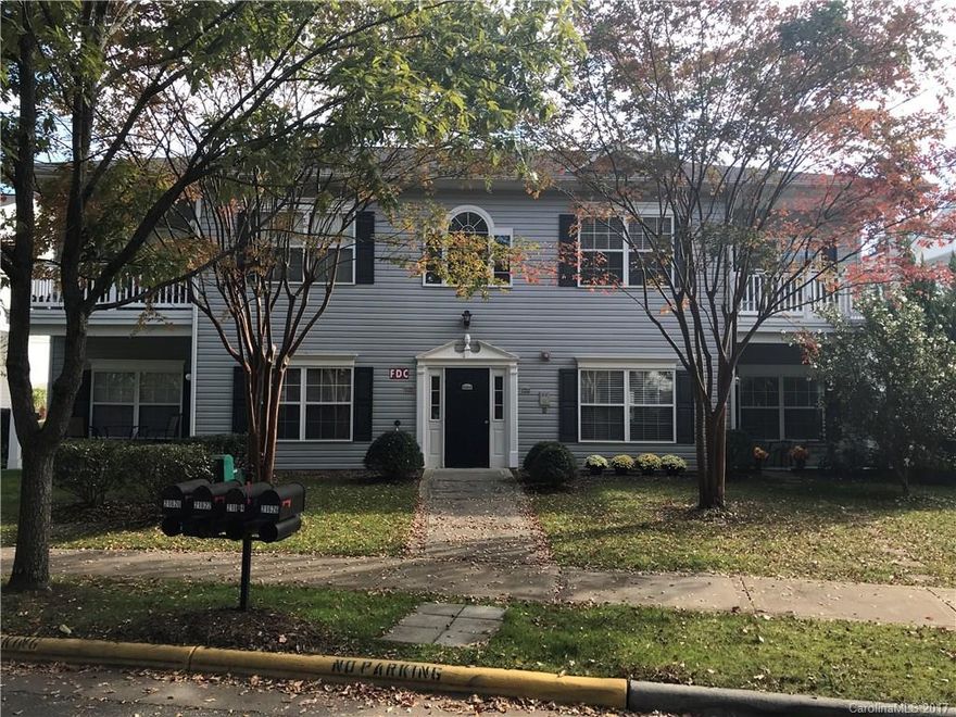 Wonderful first floor unit, open floor plan that's move in ready, big family room pre wired for surround sound, huge kitchen area, lots of cabinets and counter space, big eat at bar, breakfast or dining area large enough for big table, first bedroom plenty big with walk in closet, master suite has walk in closet and private bath, beautiful flooring throughout home, no carpet in this unit, covered front porch perfect for relaxing and enjoying beautiful street scape, awesome Cornelius location!!