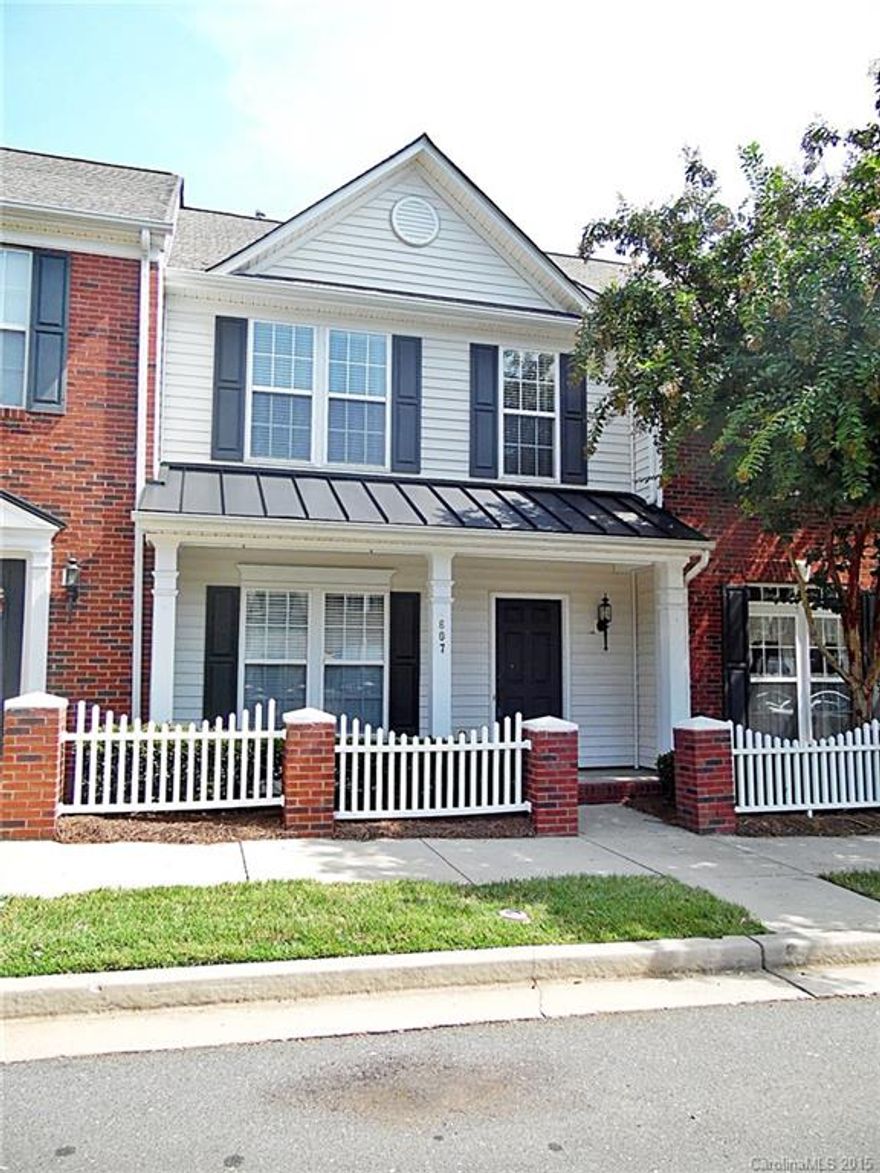 Inviting 2 BR/2.5 BA townhome in desirable Atherton Place is a wonderful place to call home!  Convenient to shopping, the movie theater, dining, and more - plus quick access to the interstate and mall.  Enjoy upgrades such as ceramic tile and hardwoods.  Fantastic floor plan offers spacious bedrooms, formal dining room, and open kitchen with work island and keeping room.  Relax on your rocking chair front porch or take a swim in the community pool!?  Move in ready - just waiting on you!