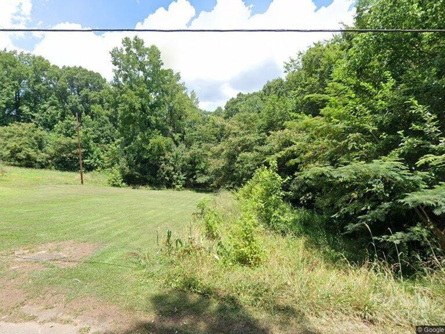 Discover your perfect piece of land in Lancaster County with this .43-acre lot located within county limits. The property offers endless possibilities for building your dream home or developing a subdivision, with available county water and sewer services.  Opportunities for investment or creating a private estate. Additionally, the property can be sold separately or combined with 2309 Old Blackman Road. Conveniently situated near Lancaster's local amenities and outdoor attractions, this spacious land is ideal for investors, developers, or anyone seeking a large property with great potential.