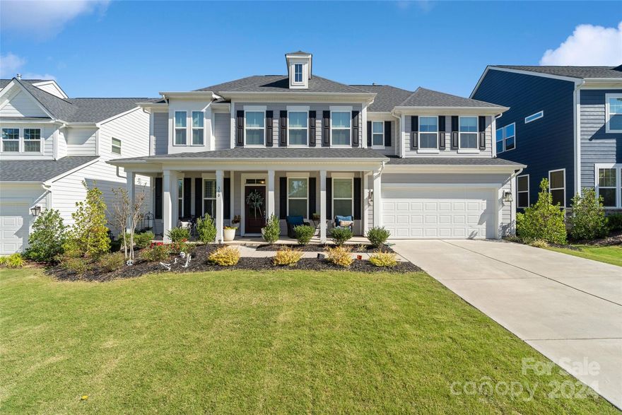 Welcome to the highly desirable Paddler’s Cove community! This spacious 5-bedroom, 3.5-bath home offers a thoughtfully designed floor plan, including a guest bedroom with a full bath on the main level. Upon entering, you'll find a private study with French doors and a formal dining room with a tray ceiling and butler’s pantry, perfect for entertaining. The gourmet kitchen is the centerpiece of the home, featuring an oversized island with seating, a 5-burner gas cooktop, quartz countertops, a farmhouse sink, and a walk-in pantry. The large family room is warm and inviting with a gas log fireplace and abundant natural light from custom-blinded windows. Upstairs, the extended primary suite offers a serene retreat with dual sinks, a soaking tub, a semi-frameless shower, and a spacious walk-in closet. For added convenience, the home includes a vehicle charging station. Enjoy the fenced backyard and covered patio, perfect for relaxing or hosting gatherings.