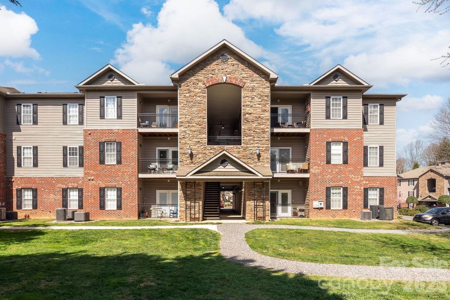 Welcome to The Grove at Appeldoorn, this second-level condominium offers a well-designed layout, low-maintenance living, and a peaceful setting overlooking the community green space. Private covered balcony with views of the landscaped park, picnic area and pet friendly. Inside, the unit features an open-concept living, dining, and kitchen area with abundant natural light and a comfortable flow for everyday living and entertaining. Newly replaced HVAC and Hot Water heater in 2021. The kitchen is both functional and inviting, offering ample cabinetry, a pantry, breakfast bar seating, and a full appliance package. A spacious primary suite featuring a walk-in closet and ensuite bathroom. A second bedroom and full bathroom offer flexibility for guests, a home office, or additional living needs. Additional features include a main-level laundry closet, dedicated storage space, and low-maintenance finishes throughout. Set within a well-maintained community just minutes to Biltmore Village, shopping, dining, and I-40, this home combines convenience, comfort, and access to outdoor amenities in one of Asheville’s most accessible locations. No Rentals Allowed.