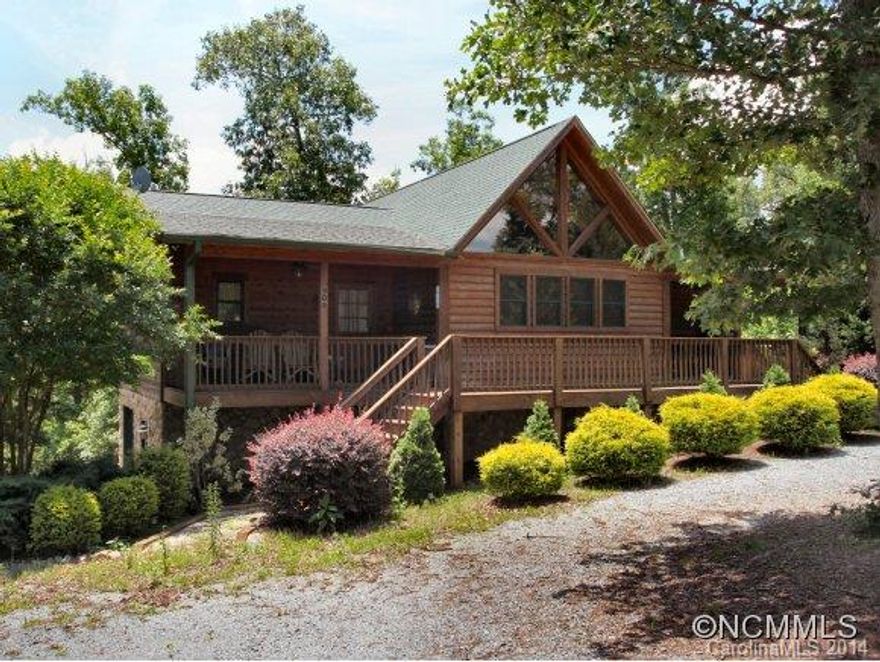 Wonderful log home in a peaceful setting only minutes to Cleghorn and White Oak golf courses. The large great room boasts vaulted, beamed ceilings and a native stone FP. Kitchen features custom bead board cabinets and center island/breakfast bar. The Master Suite has a large walk-in closet and sliding glass door access to the full width deck. The lower level features a large family room with wet bar and kitchenette, 1-car garage and patio access