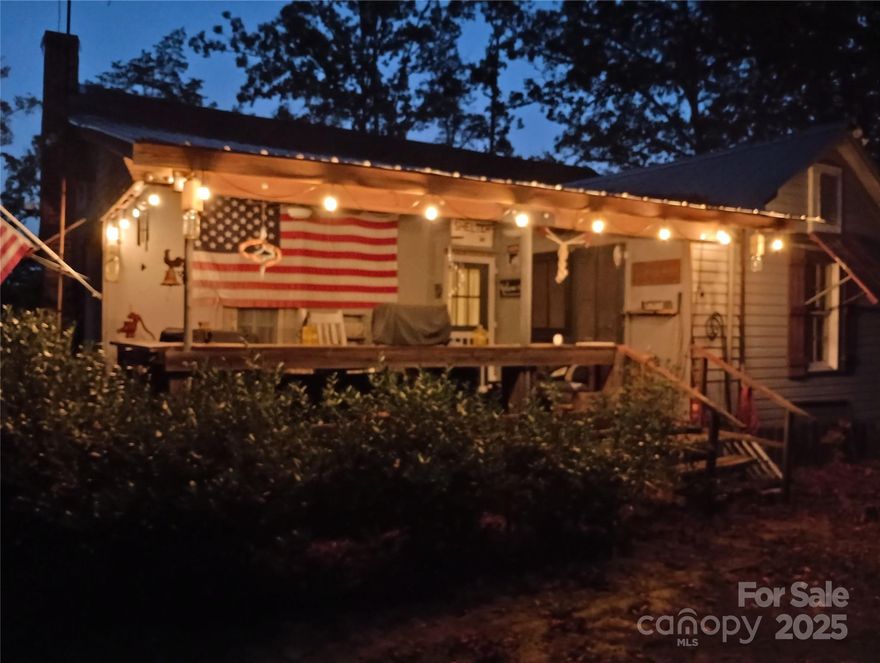 Escape to 23 acres of peaceful countryside in Chester County, SC! This unique property—formerly "Camp Blue Cloud"—features a 900 sq. ft. 1BR/1BA lodge with remodeled bath, wood-burning insert, kitchen w/ cooktop, oven, microwave, fridge, beautiful hardwood floors, and 200' covered porch with stunning long-range views. Enjoy privacy and potential with well, septic, and a mix of cleared land and woods—perfect for a hunting retreat, weekend escape, or building your dream home. Zoned R-2 with endless possibilities. Just 7 min to Chester, 30 min to Rock Hill, 53 min to Charlotte, and 1 hr to Columbia. Minutes to Chester State Park & Mountain Lakes Recreation Area. Don’t miss this rare opportunity!