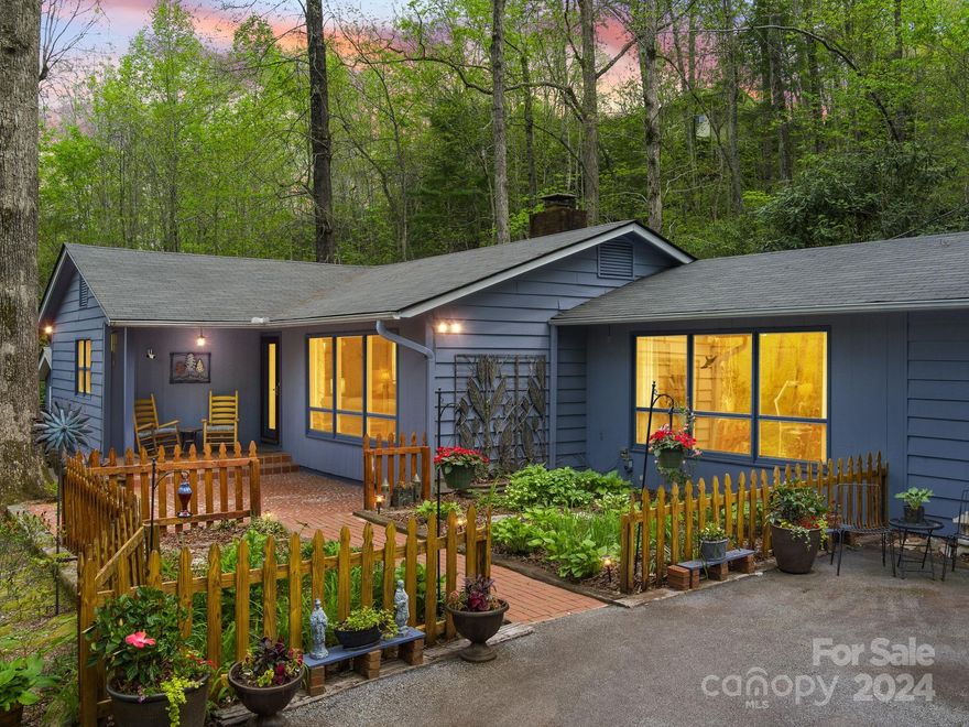 *Back on the market due to last minute buyer financing.* Showings to recommence on Monday afternoon, 5/20. Here's your chance for the perfect balance of location and privacy, conveniently located in beautiful Tryon, NC! This classic, move in ready, mid-century home is ready to support a wide variety of lifestyles without the immediate, endless to-do list. Extensive care has been given to the exterior with a new roof, siding and soffit rehab, and a fresh coat of paint; not to mention the work to the multi-level deck and detached screened-in sanctuary, or the lovingly revitalized yard/garden area. Inside, functional and cosmetic upgrades abound; everything from updated lighting, kitchen and bath fixtures, to a brand new mini-split unit, to garage improvements adding to its, already, over-sized functionality. Even with these many modernizing conveniences, along with the main HVAC system replaced in 2018, this home retains the same charm as vintage and as timeless as Tryon!