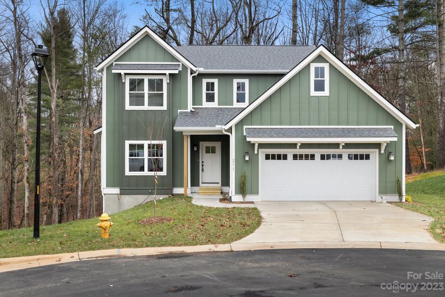 Under construction in Arden! Surrounded by all of the beauty that Asheville has to offer and only 1.8 miles from Biltmore Park Town Square, Ellis Place is the perfect place to call home. The Bradley model features a spacious open floor plan, granite countertops in the kitchen and bath, large laundry room, owner's suite on second floor and more. This quaint, conveniently-located community offers 24 homesites and 8 different home plans, providing you the variety you're looking for when building your dream home. Home to be complete early December 2023. DON'T MISS IT — Exclusive builder offer of 2% off the interest rate for the first year if using the preferred lender for qualified buyers!