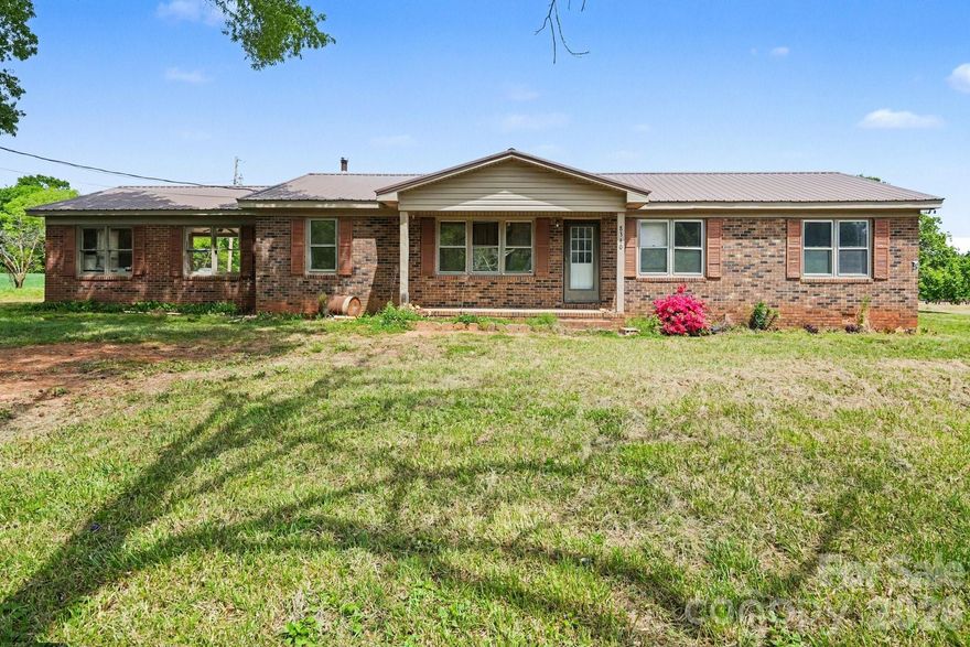 Charming brick ranch nestled in a quiet rural setting, offering the perfect opportunity to create your dream home. Surrounded by peaceful countryside, this property provides a sense of privacy and space while still being within a convenient distance to nearby amenities. Inside, you’ll find a solid layout ready for your updates and personal style. Whether you’re looking to renovate, invest, or enjoy a relaxed country lifestyle, this home is waiting for your vision to bring it to life.