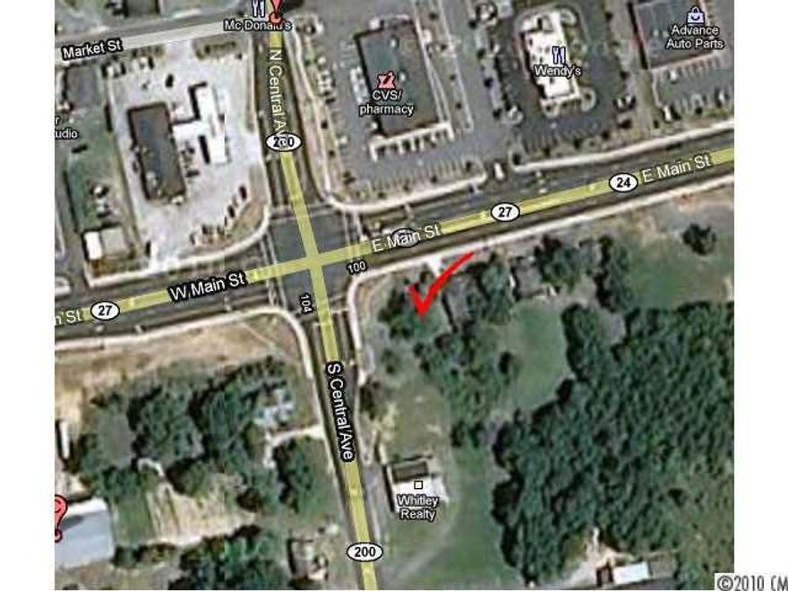 Great corner lot in Locust. This property consist of 7 parcels: 557503428405, 557503428501, 557503428505, 557503427650, 557503428643, 557503429539 and 557503429691. Acreage is subject to a survey and seller may choose to remove the house located at 104 E. Main Street. There is also Additional acreage available across the street.