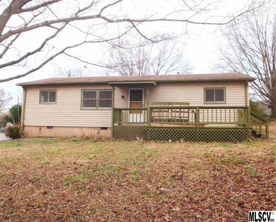 LOOKING FOR AN INVESTMENT?  This home does need work but it has a lot to offer!  Features include: 1179 sqft, 3 Bedrooms (split plan), 2 Full Baths, Spacious Family Room in the front, Extra Den / Playroom in the back, Large Eat-In Kitchen with custom-built wood cabinetry, Vinyl Siding, Front Porch, covered Back Patio and Level, Corner Lot. HVAC unit was installed in 2011.  All you need is to have a little vision and see the potential!