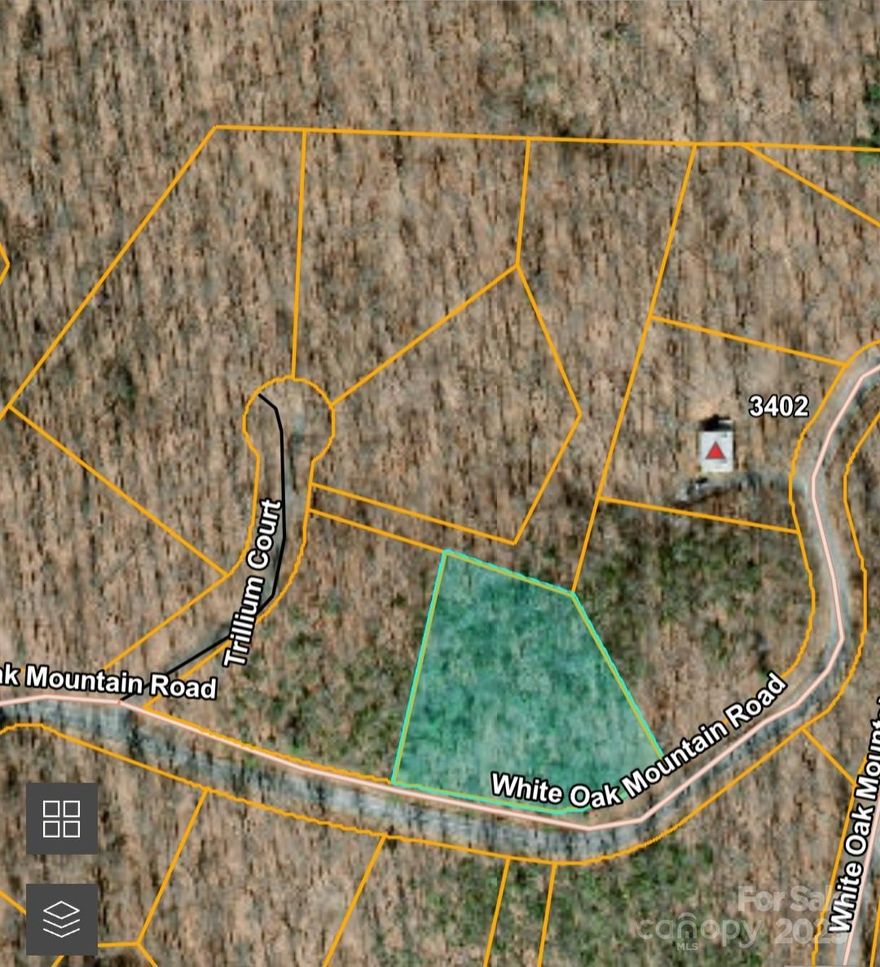 Privately located on the backside of White Oak Mountain - this 1+ acre lot sits high on a ridge and provides a nice building site for a private, secluded home!  Lot is one of 5 for sale in a row along White Oak Mountain Rd. - this is a good opportunity to buy a couple lots to insure extra privacy!  White Oak Mountain is located in Columbus, NC and offers a peaceful & quiet location to live, abounding with wildlife, scenic ponds, trails, and more.  White Oak is where Blue Ridge got their beginning back in the 80's, developing log cabins on the mountain. While the Mountain attracts many full time residents, it is still a very popular getaway location today... for 2nd homes & retirees!  The Association offers fishing ponds, picnic areas, a pavilion for residents to use, and walking trails. The association has a very informative website. Restrictions apply - no manufactured homes, HOA Dues, etc.