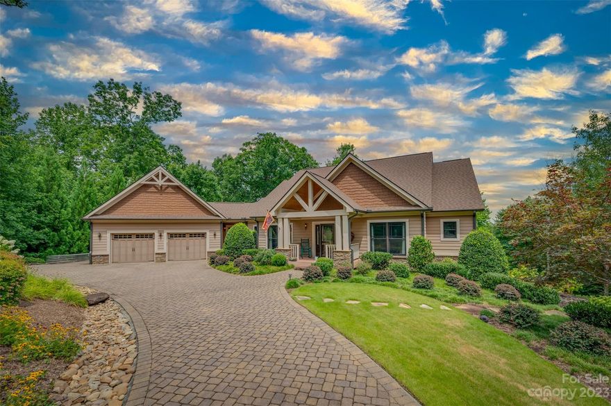 Escape to your mountain recreation retreat!  This home offers thoughtfully designed spaces to tuck away and relax or get outdoors and have some fun.  Underground utilities including gas, electric, water, sewer, fiber optic internet and DISH cable, and equipped with a whole-house generator.  Large climate-controlled bonus area/workshop directly off main level as well as lower-level bonus room.  Fenced area includes in-ground pool with slide, hot tub, and space for a fire pit.  Outdoor kitchen with leathered rainforest granite in 1 of the 2 large screened-in covered porches on the main level.  Indoor entertainment area includes wet bar with dishwasher and 500 bottle wine cellar, and outdoors you'll find the custom-built bocce court. Some of the specially added extras are heated bathroom floors, gutter guards, composite decking, large cedar closet, ceiling fans, tankless water heater and whole house water filtration system.  All this bordering Harm Creek and a view for miles!