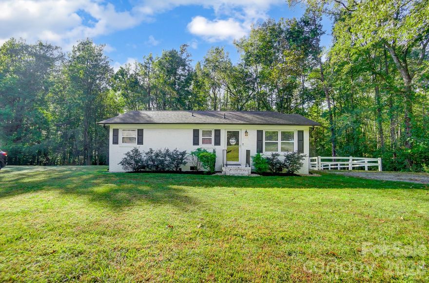 Not too many of these opportunities come to Concord! Adorable brick ranch updated throughout, and extremely well maintained. Nice LVP flooring in main living areas. Kitchen features granite countertops, island counter, and stainless steel appliances. Nice sized bedrooms. All windows were replaced in 2020. Fully fenced in yard, and sits on roughly 1/3 of an acre. No HOA and no city taxes! Home is located on a quiet street with just 8 homes, and backs up all trees. A truly "move on in" type home.