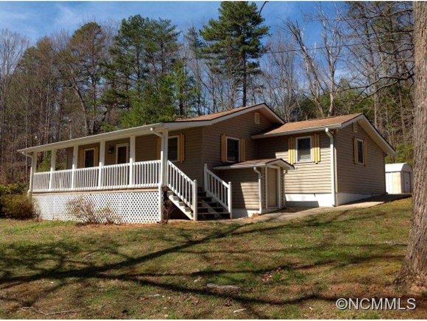 3 BR ranch style home has large, light, airy rooms; a clean and well maintained feel; and a private location even though it is close to I40. The home features an eat-in kitchen with new cabinets (refrigerator, range, and diswasher included), a living room with vaulted ceilings & FP, fantastic updated BA, extra 1/2 BA, and a master BR with a massive walk in closet.  +/- .43 acres with privacy.  Partial BSMT.  Storage Bldg.