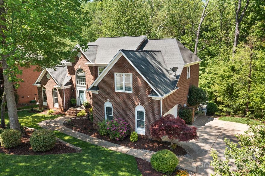 Step into this beautifully designed Toll Brothers home, featuring a grand great room and foyer with soaring ceilings, floor to ceiling fireplace complemented by an impressive catwalk above. The primary suite is a sanctuary, boasting a vaulted ceiling with wooden beams and spacious closets equipped with custom built-ins. Each expansive bedroom has its own en-suite bathroom, ensuring privacy and convenience for both family and guests. At the heart of the home, the gourmet kitchen includes a butler’s pantry with a wine fridge, perfect for entertaining. The first-floor office is spacious and functional, complete with French doors and a built-in closet. Outdoors, the home offers a three-tiered experience an upper deck with a gas grill, a middle tier with a cozy hot tub and fire pit, and a spacious lower yard for games. Additional amenities include a bonus room with a wet bar, built-in storage in the laundry room, and hardwoods throughout the main level, upstairs carpets replaced in 2021.