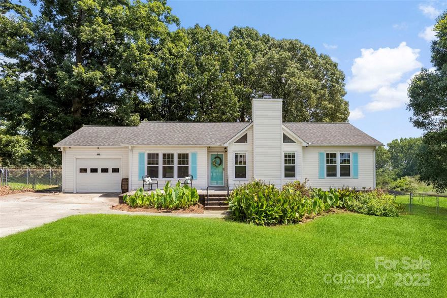 Motivated seller and willing to give $5k closing cost credit or flooring allowance.  Charming ranch home sitting on .44AC, 3BR, 2 BA with 1,390 sq ft. offering a open floor plan concept.  Family room has vaulted ceiling, neutral paint throughout the home, fireplace, natural light from the beautiful windows that overflows into the dining area.  Kitchen has SS refrigerator, cabinets, and breakfast area. Laundry room.


Relax on your large front porch or deck in the back.  Outbuilding with plenty of storage, fenced in back yard. Start making your memories today.