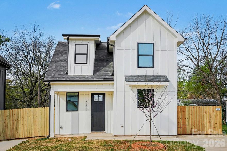 Check out this brand new home with tons of upgrades near Uptown Charlotte! Inside you will find an open floor plan, two bedrooms and one and a half baths. The kitchen features quartz counters, soft-close shaker cabinets, a tile backsplash and a pantry. Enjoy spacious 9' ceilings throughout the first floor. Additional upgrades include mid-century modern light fixtures, an accent wall, custom built-in closet shelving, and even a hardwood staircase. The exterior of the home has been upgraded with fiber cement board, which is stronger and more durable than vinyl. The fenced-in backyard supplies ample outdoor living opportunities, and is great for pets! This thriving area is full of new construction homes all around. Come and see this one for yourself!