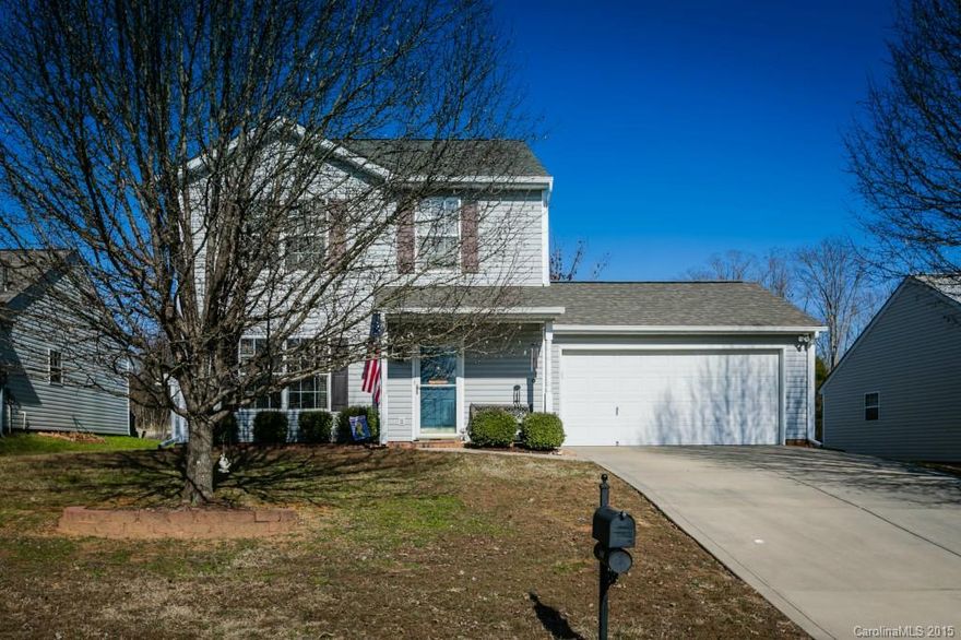 New 2014: Roof (architectural), gutters, countertops, backsplash, garbage disposal, & water heater!  HVAC maintained 2x per yr! Tile foyer, Pergo floor in living w/ceiling fan, crown molding, gas f/p w/tile surround, & wired for surround sound. Eat in kitchen w/ceiling fan & light, like new vinyl flooring, cabinetry hardware, window over sink & exit door to rear yard-wooded privacy behind lot, extended patio, wood burning fire bowl. Finished garage w/push up floored storage. See tour for more!