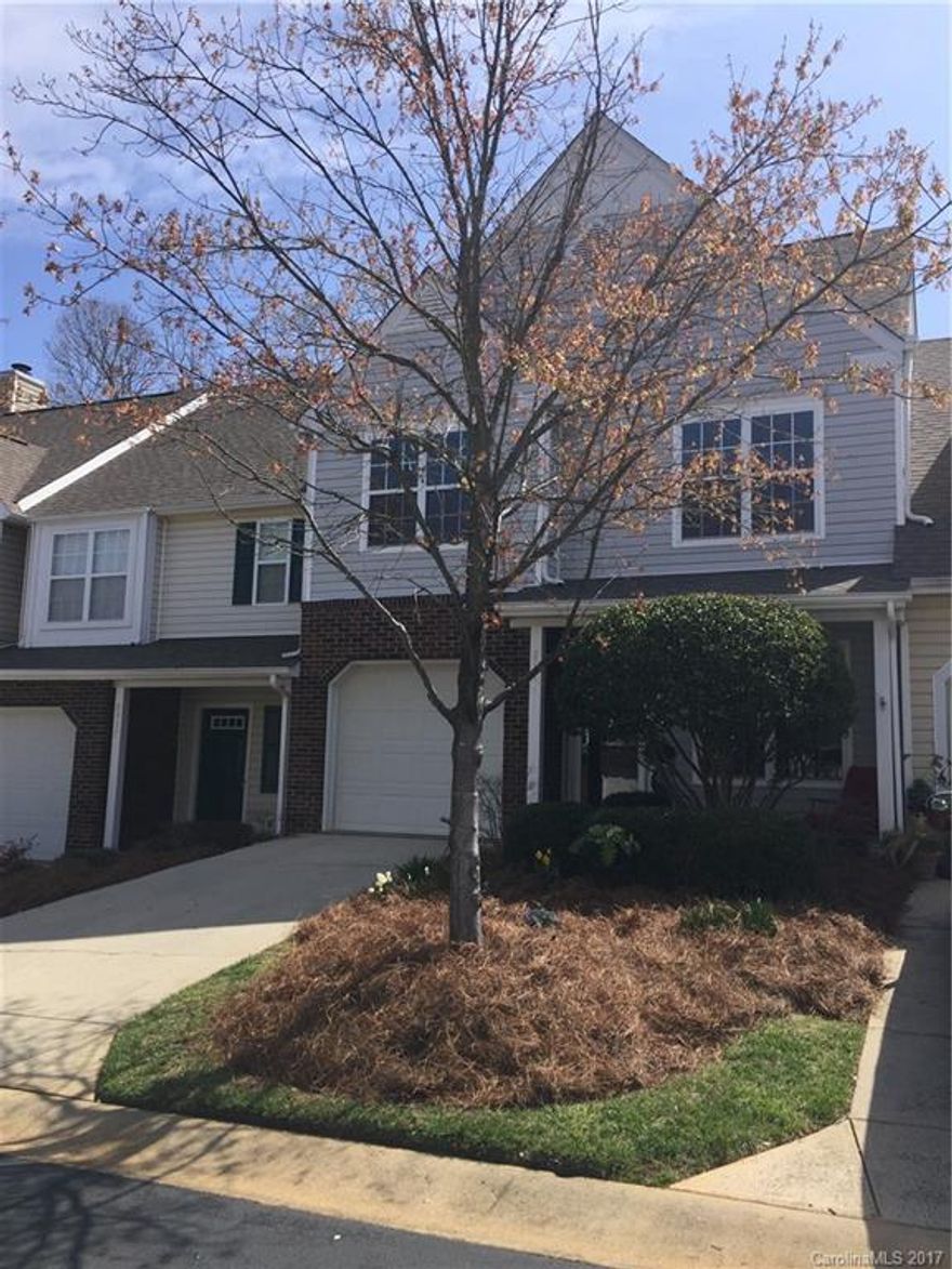 CHARMING Townhome in the HEART OF BALLANTYNE/TOP RATED Schools. Extremely QUIET and PRIVATE neighborhood with Swim Club. New Paint/Hardwoods on main/Great Room with vaulted ceiling and REAL wood burning fireplace! Master bathroom has updated walk in shower. Loft can be used as 3rd bedroom, office, or playroom. Tile floors in bathrooms. Storm doors front and back. Great outdoor area with expanded paver patio and retractable awning. Close to 485, dining, shopping, farmers market and more!
