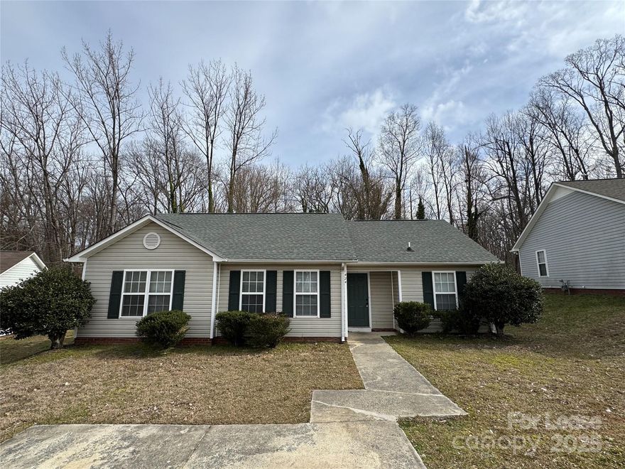 Nestled in the highly desirable Sadler Ridge community, this beautiful ranch-style home offers the perfect blend of comfort and convenience. Located just off I-485, it provides easy access to major interstates, shopping, and surrounding areas. Come inside to a spacious formal living room, perfect for relaxing evenings. The open-concept kitchen boasts tile flooring, granite countertops, ample cabinet space, and a separate pantry, with appliances included for your convenience. The primary suite is a true retreat, complete with a large closet and an ensuite bathroom featuring a garden tub, separate shower, and dual sinks. Enjoy the peaceful, wooded views from the back patio in this charming neighborhood. Conveniently located near Uptown Charlotte, Huntersville, Mt. Holly, Belmont, and Gastonia, with easy access to I-485 and major highways. No pets allowed. Schedule your tour today!