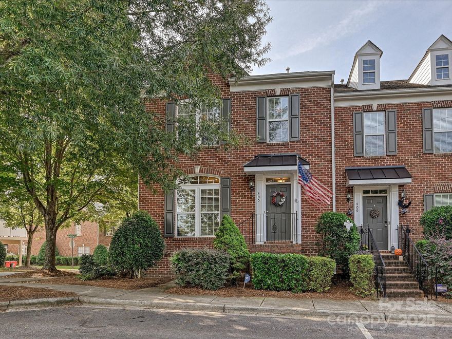 Elegant townhome living awaits in Davidson Bay with everything you want to make life easy and enjoyable close at hand...the university, lake, shopping,  dining, recreation, parks, farmers market , library, movies,  entertainment. This brick, end unit commands wonderful presence and curb appeal while offering an open and spacious plan with exquisite custom appointments and gorgeous hardwoods that would delight the most demanding buyer.   The gourmet Kitchen features stainless, granite, tile backsplash, an abundance of cabinets, double oven, smooth surface cooktop,  and breakfast bar.  (Refrigerator to remain).   Dining area is roomy with a bay window for natural light.  The Great Room is large with a gas log fireplace.  The Living Room offers space for formal living or dining, office, or den.  The Owners Suite is upstairs with a tray ceiling, walk in closet, double sinks, garden tub, and tiled shower.  Two secondary bedrooms are also upstairs along with a good -sized hall bath.  Laundry is upstairs as well.  Finished basement could be used as a Bonus Room or Bedroom #4 with full bath and walk-out access to the two car garage.   The deck off the Great Room has plenty of space for entertaining or relaxing plus its own gas line for the grillmaster!   Easy living and charm make this townhome the perfect place to call home! Check out dbayhoa.com for neighborhood information.  Roof placement scheduled for April.