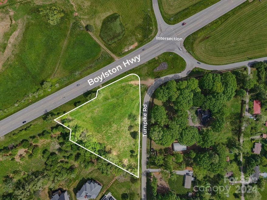 This 2.85-acre parcel is Zoned for MR-MU. the property comes in a relatively flat landscape, offering the limitless potential for, Commerce, or Residential use. The undulating landscape blends tranquility with practical advantages, making it an ideal canvas for various land uses. With a history of having an old home that was torn down. Left behind underground utilities like power and possibly a city water hook-up "needs confirmation", also a possibility for Fiber optics being the main internet "needs confirmation". Its strategic location in Mills River, close to Asheville, Brevard, and Hendersonville, positions it perfectly for Multi-family or commercial development like a business office, ensuring close connectivity to markets and essential amenities. this is a gem not often found in real estate. Don't let this one slip away, book your showing today!