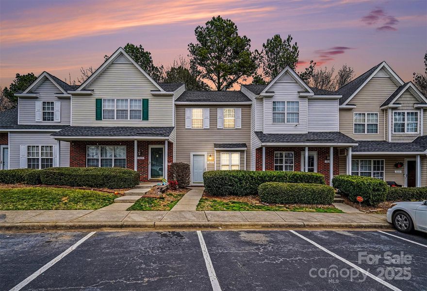 This 2-bedroom, 1.5-bath townhome features new vinyl plank flooring throughout and a kitchen with granite countertops and stainless steel appliances. The home offers spacious bedrooms and includes a washer and dryer for added convenience. Enjoy assigned parking and access to a neighborhood pool. Conveniently located near UNC Charlotte and shopping, this property is an excellent starter home or investment opportunity in the University Area.
