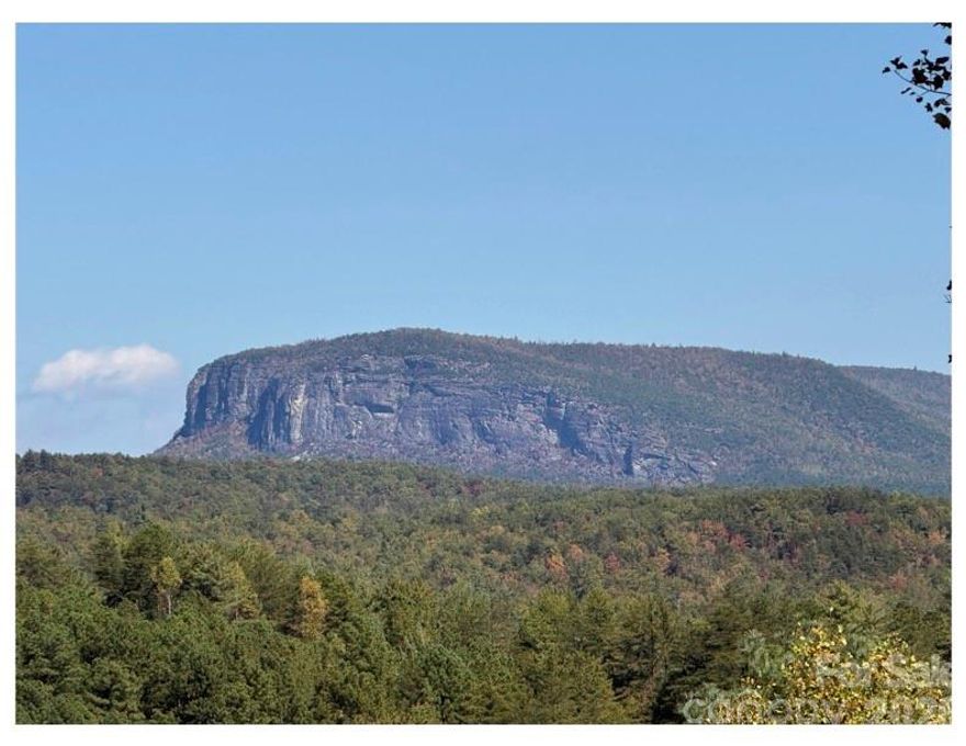 Experience the pinnacle of lakeside living on Lot 4 Pisgah Preserve Drive, a premier homesite offering what are arguably the most breathtaking views in all of Lake James. This exceptional property provides a front-row seat to the dramatic face of Shortoff Mountain and only 7 minutes to Bear Creek Marina. Perfectly positioned within the gated Pisgah Preserve community—which borders the vast Pisgah National Forest—this lot is ready for your custom mountain masterpiece with a septic permit already on file and available in the listing attachments. Whether you are seeking a serene retreat or an architectural showcase, this rare vantage point captures the very best of Western North Carolina’s natural beauty.