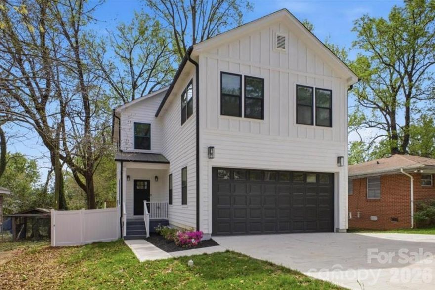 Step into elevated city living at 1413 Hateras Avenue, where modern comfort meets an unbeatable location just minutes from Uptown Charlotte. This thoughtfully designed 4-bedroom, 2.5-bath home offers a seamless blend of style and functionality, highlighted by an airy open floor plan filled with natural light.

Take in breathtaking skyline views from not one, but two spacious balconies—perfect for starting your day or unwinding in the evening. The primary suite serves as a true retreat, complete with a spa-inspired bath featuring a soaking tub, upscale finishes, and a bidet for an added touch of luxury.

Three additional bedrooms provide versatility for guests, a home office, or whatever suits your lifestyle. Outside, enjoy a newly installed privacy fence that creates the perfect backdrop for relaxing or entertaining in your backyard. An oversized garage adds convenience with ample space for parking and storage.

All of this, just moments from the vibrant energy of Uptown’s dining, shopping, and entertainment. This is an incredible opportunity to own a stylish, move-in-ready home in a prime Charlotte location.