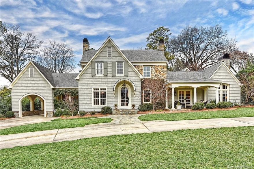 Charming cedar and stone home on incredible lot.  Formal living & dining rooms.  Large den with fireplace.  Beautiful master suite off library on Main.  Chef's kitchen recently updated.  Covered porch off rear overlooking private backyard that has been beautifully landscaped.  Stone patio.  Upstairs has 3 bedrooms and 2 baths.  Loft.  Craft room/playroom.  One car hard coat stucco garage has a great guest suite above it.