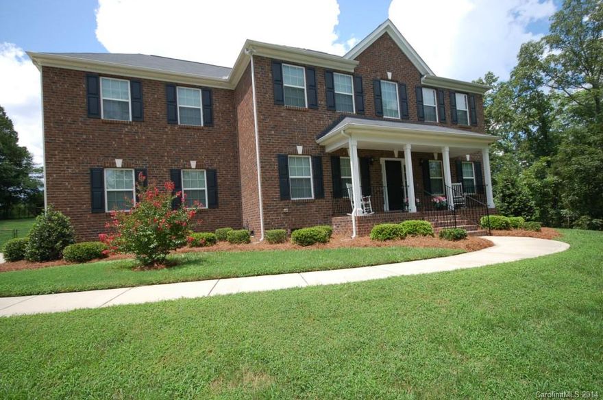 DOUBLE INSULATED & FULL BRICK!  This HIGHLY energy-efficient home averages an approx. $109/month electric bill in this summer heat! On-site finished wood floors in DR, kitchen & brkfst area.  Kitchen boasts gorgeous granite countertops, stainless steel appliances & bar for add'l dining & open to spacious great room with gas log fp! Ceiling fans in every BR!  Expensive ornate black metal fenced in backyard to enjoy privacy at its best!  Side load garage with epoxy floor finish!  No HOA!