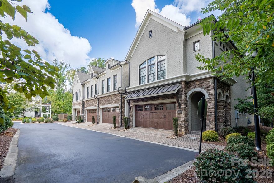 Welcome to your private SouthPark retreat—where upscale living meets unbeatable location! This stunning end-unit townhome offers the perfect blend of luxury, function, and nature, all just steps from SouthPark’s premier shopping and dining at Phillips Place, SouthPark Mall, and Whole Foods.

Step inside to rich, dark hardwood floors and a spacious, light-filled layout designed for modern living. The gourmet kitchen is the heart of the home, featuring stainless steel appliances, a large island, and seamless flow into the dining and great room—ideal for entertaining!

With bedroom suites on each level, the floorplan offers ultimate flexibility for guests, home office, or recreation. The serene master suite is a true retreat, showcasing a wall of windows, spa-inspired bath, and custom walk-in closet. Enjoy indoor-outdoor living with multiple terraces that overlook a peaceful wooded landscape—perfect for morning coffee or evening gatherings.

Additional highlights include:
• Stone patio + upper deck for outdoor entertaining
• 2-car garage & ample guest parking
• Stone veneer siding & low-maintenance exterior
• Low HOA dues & quiet, tucked-away neighborhood

This rare SouthPark gem combines the ease of walkability with the serenity of nature—a truly unmatched lifestyle. Schedule your private showing today and discover why this one won’t last!