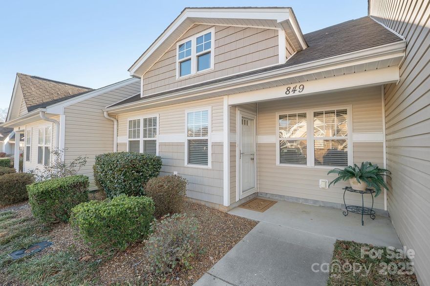 Charming and well-kept townhome ideally situated near the heart of Statesville in the Vintage Place Townhomes community. This single-level home features 2 bedrooms and 2 bathrooms, an open kitchen, and a spacious living and dining area with vaulted ceilings. The primary suite includes a private bath and walk-in closet. Enjoy low-maintenance living with laminate and vinyl flooring throughout—no carpet! All kitchen appliances included. Relax on the covered front porch or entertain on the roomy back patio. Conveniently close to downtown shops, restaurants, a grocery store, and a pharmacy, with Iredell Memorial Hospital and plenty more shopping and dining just minutes away.  New paint and some flooring.