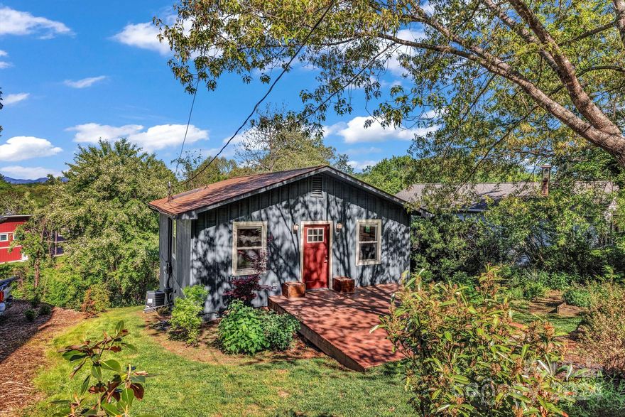 Nestled in the heart of Asheville, this charming 2-bedroom, 2-bathroom house offers the perfect blend of urban convenience and serene mountain living. Enjoy beautiful views of the Blue Ridge Mountains, visible from the comfort of your own backyard or the newly added private deck off of the primary bedroom. The property boasts ample space for parking with room for up to six vehicles, ensuring both convenience and peace of mind for residents and guests alike. Step outside onto the covered patio, seamlessly extending from the first level, providing an ideal setting for entertaining or simply enjoying the tranquil surroundings. Additional unique features include new roof, skylight in the bathroom, & potted fruit plants in the backyard. With its prime location and array of amenities, this home embodies the quintessential Asheville lifestyle, offering a perfect retreat from the bustle of city life while still being close to all the vibrant culture and attractions the area has to offer.