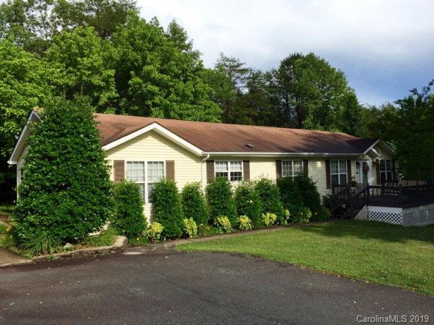 BRIGHT & FRESH NEBO HOME - 3 Bedroom, 2 Bath 1998 home located in beautiful Nebo. With lovely woodland views, this well maintained home has a large living/dining room; large den with gas fireplace; well designed eat in kitchen with full appliances & bar area. There is a split BR plan w/ the Master BR having a walk in closet and master bath suite with garden tub. The 2 additional bedrooms have good storage. Other features include an extra nice mud/laundry room, rear deck and front deck, and bonus office room. Home has attractive stone foundation; detached & wired workshop space, separate outbuilding, & good parking area; Move In Ready!!