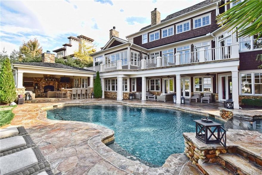 Gated entrance to this stunning waterfront home in great condition in one of the the most desired Lake Norman locations. Attention to detail with no compromises. Great lake location with beautiful views. Enjoy the lake lifestyle from indoor and outdoor living and entertaining spaces.