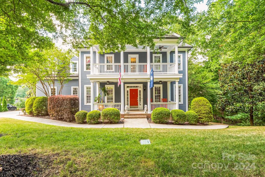 165 feet of lakefront bliss on Lake Wylie with a 2-story dock, 9000-pound boatlift, floating U-shaped dock, sundeck, and tiki bar will have you wishing summer would never end. Deepwater drop-off at dock allows for boat egress even during the worst droughts. Extensive retaining wall system creates level backyard for all your favorite lawn games. Zoned irrigation system keeps everything green using lake water so your water bill is unaffected. The Charleston-style house has upper and lower front porches for rocking your cares away. 4 bedrooms and 4 baths (3 full & 1 half), large bonus room, formal dining room, office w/ French doors, great room w/ gas fireplace, gourmet kitchen w/ double ovens and large island for entertaining, laundry room w/ included pedestal washer and dryer. Finished walkout basement includes storage room, workshop, Travertine bath w/ steam shower, living room, 2nd gas fireplace w/ stone surround, wet bar,and gym w/ mirror wall and ballet bar. 2 decks and 2-car garage